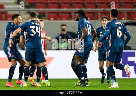 PIREO, GRECIA - MARZO 11: Squadra dell'Arsenale FC che celebra l'obiettivo di Martin Odegaard dell'Arsenale FC durante l'Olympiacos contro Arsenal - UEFA Europa League Foto Stock