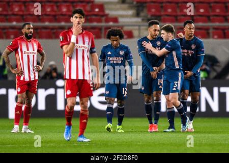 PIREO, GRECIA - MARZO 11: Squadra dell'Arsenale FC che celebra l'obiettivo di Martin Odegaard dell'Arsenale FC durante l'Olympiacos contro Arsenal - UEFA Europa League Foto Stock