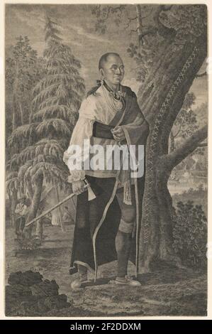 Ritratto di Hendrick, Mohawk chief, a lunghezza intera azienda permanente tomahawk con scena di camp in background Foto Stock