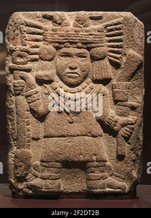 Aztec pietra Carving raffigurante Chicomecóatl la Dea di Maize Foto Stock