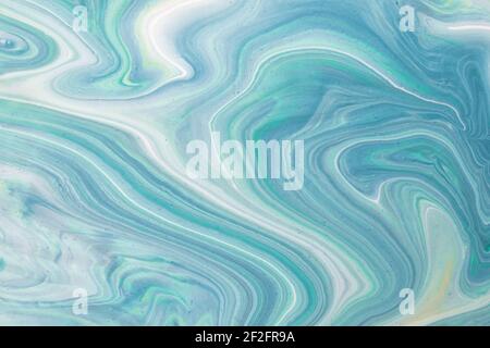 Astratto fluido art sfondo azzurro e ciano colori. Marmo liquido. Pittura acrilica su tela con gradiente turchese. Sfondo acquerello con Foto Stock