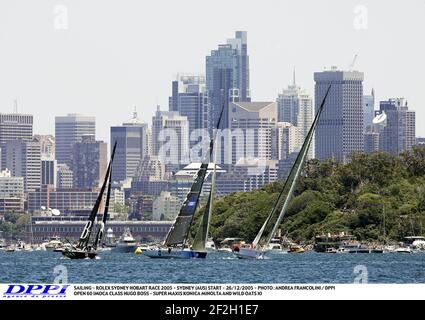 VELA - ROLEX SYDNEY HOBART GARA 2005 - PARTENZA SYDNEY (AUS) - 26/12/2005 - FOTO : ANDREA FRANCOLINI / DPPI APERTO 60 IMOCA CLASSE HUGO BOSS - SUPER MAXI KONICA MINOLTA E AVENA SELVAGGIA XI Foto Stock