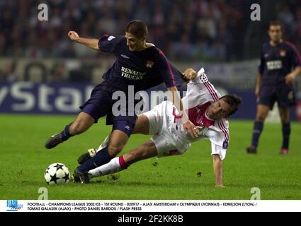 FOOTBALL - CHAMPIONS LEAGUE 2002/03 - 1ST ROUND - 020917 - AJAX AMSTERDAM v  OLYMPIQUE LYONNAIS - JOY ZLATAN IBRAHIMOVIC / CRISTIAN CHIVU (AJAX) - PHOTO  DANIEL BARDOU / FLASH PRESS Stock Photo - Alamy