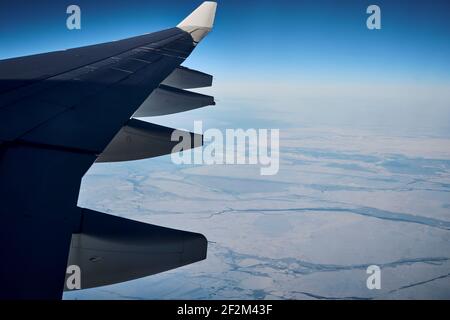 Vista aerea del ghiaccio da scaffale della groenlandia visto da aereo jet, Groenlandia, Regno di Danimarca, Nord America Foto Stock