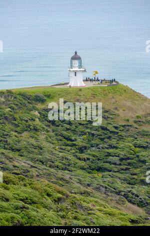 Paesaggio costiero con faro intorno a Capo Reinga a nord Isola in Nuova Zelanda Foto Stock