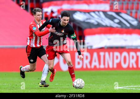 EINDHOVEN, PAESI BASSI - MARZO 14: Olivier Bosscagli di PSV, Steven Berghuis di Feyenoord Rotterdam durante la partita olandese di Eredivisie tra PSV Eindh Foto Stock