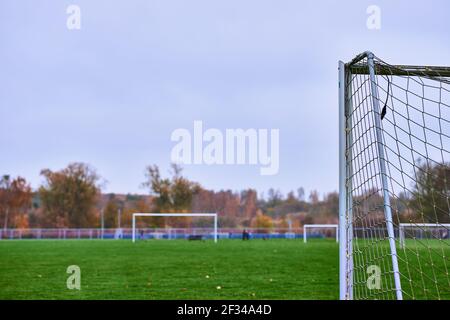 a large soccer field with big soccer goal Foto Stock