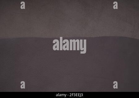 Sfondo in pelle. Texture di vera pelle e pelle scamosciata.pezzi marroni in pelle.pezzo in vera pelle di colori marroni.produzione da genuino Foto Stock