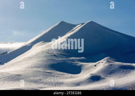 Il Monts Dore in inverno, Massif di Sancy, Parco Naturale Regionale dei Vulcani d'Alvernia, dipartimento Puy de Dome, Auvergne, Francia Foto Stock