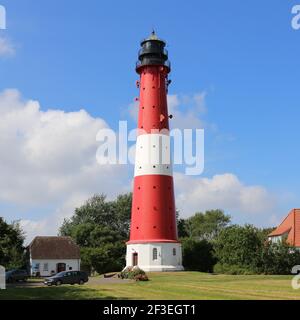 Un alto faro sul Mare del Nord tedesco Isola di Pellworm Foto Stock