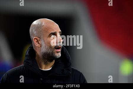 Budapest, Ungheria. 16 Marzo 2021. Calcio: Champions League, Manchester City - Borussia Mönchengladbach, round di knockout, round di 16, seconde gambe alla Puskas Arena. Il pullman Pep Guardiola di Manchester City arriva allo stadio. Credit: Marton Monus/dpa/Alamy Live News Foto Stock