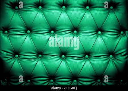 Fondo in pelle verde con motivo a bottoni Foto Stock