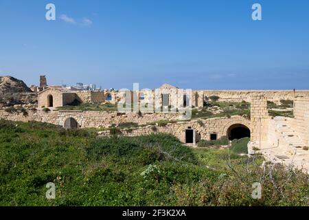 Frammenti di foto e rovine di Forte Ricasoli che fu costruito dall'ordine di San Giovanni tra il 1670 e il 1698, situato a Kalkara, Malta. È la larg Foto Stock