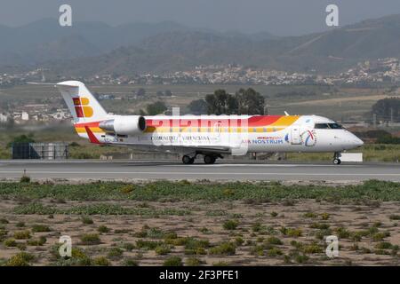 Bombardier CRJ-200 (EC-JEF) Iberia Regional - Air Nostrum pronto a decollo, Malaga, Spagna. Foto Stock