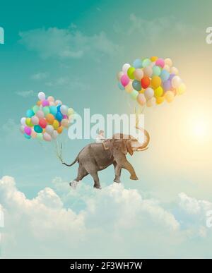 Bambina che cavalca un elefante con palloncini, volando nel cielo; fantasia, metafora, concetto di realizzazione Foto Stock