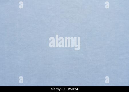 Tessuto pastello di lino azzurro, sfondo o trama, primo piano, vista dall'alto, orizzontale Foto Stock