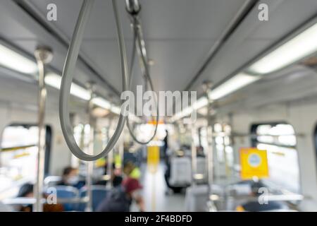 Primo piano corrimano della metropolitana SkyTrain Canada Line. Foto Stock