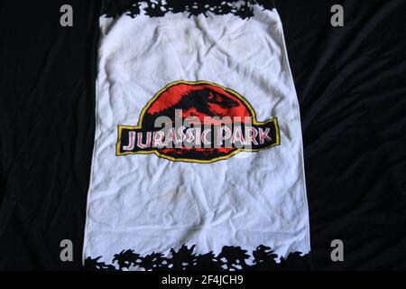 Souvenir natalizi con una spettacolare stampa su schermo del Jurassic Park un pezzo di stoffa Foto Stock