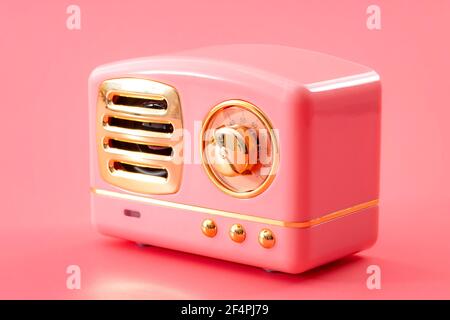 Tecnologia d'epoca, impianto audio anni '70 e sistema audio dal vivo tema concettuale con sintonizzatore radio retrò con manopola cromata in metallo isolata su sfondo rosa Foto Stock