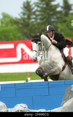 The Continental, Spruce Meadows, luglio 2002 , Ali Nilforushan (IRA) a cavallo Kodarco Foto Stock