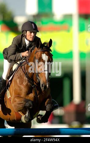 The North American, Spruce Meadows, giugno 2002, Encana Open jumper, Schuyler Riley (USA) a cavallo Illian Foto Stock