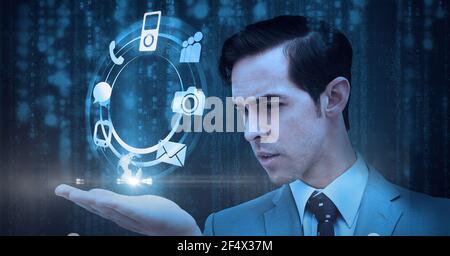 Composizione di una rete di icone digitali in cerchio sulla mano di uomo d'affari Foto Stock