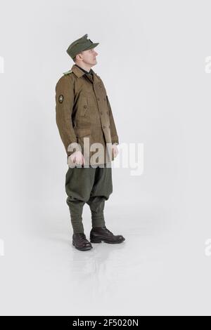 Attore maschile nell'uniforme militare invernale di un soldato tedesco, il periodo 1941-1945, la seconda guerra mondiale Foto Stock