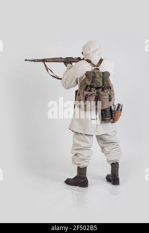 Attore maschile nell'uniforme militare invernale di un soldato tedesco, il periodo 1941-1945, la seconda guerra mondiale Foto Stock