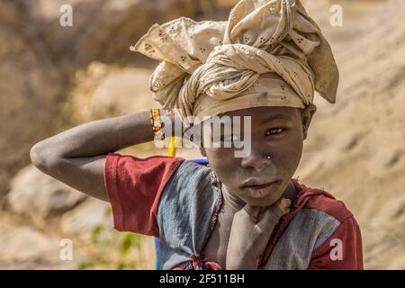 Una ragazza di Dogon nel villaggio di Ireli, Mali Foto Stock