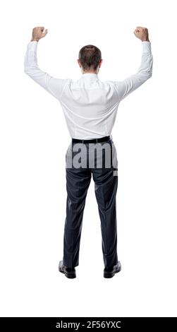 uomo d'affari con le braccia sollevate in vittoria. isolato su bianco. Vista da dietro. Foto Stock