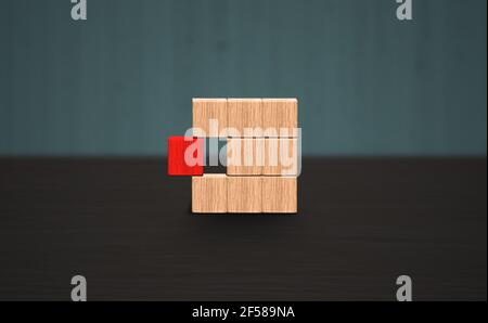 Distinguere un blocco rosso da un altro concetto di linea di associazione. Contenitore vuoto in legno con 1 caratteristico blocco rosso. Sfondo in legno con spazio per la copia. Foto Stock