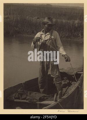 Pescatore con gamba di legno, vicino Brookgreen Plantation, Murrells Inlet, Carolina del Sud. Doris Ulmann (americano, 1882 - 1934) Foto Stock