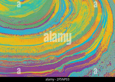 Struttura astratta di strati cerchiati multicolore nella tecnica ebru Foto Stock