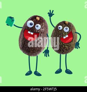 Due avocado con occhi d'oca che prendono selfie utilizzando smartpone. Foto Stock