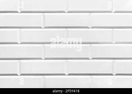 Ceramica bianco mattone chiaro moderno interno parete texture sfondo. Foto Stock