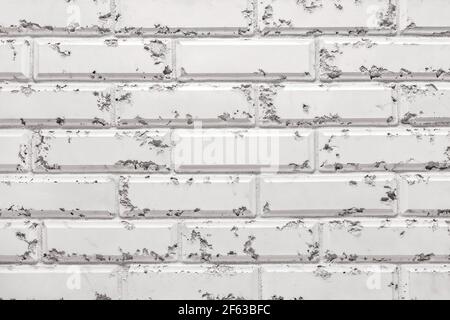 Texture di bianco muro decorativo mattone con motivi astratti sfondo. Foto Stock