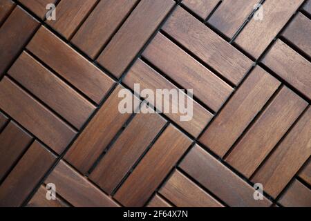 Piastrelle di legno marrone. Pavimenti per appartamenti e case Foto Stock