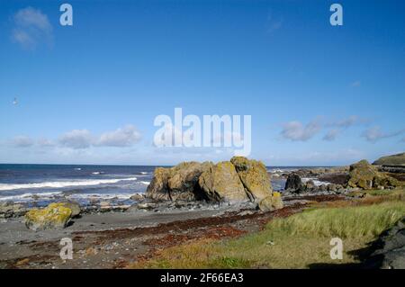 Costa frastagliata e spiaggia a Turnberry, Ayrshire, Scozia Foto Stock