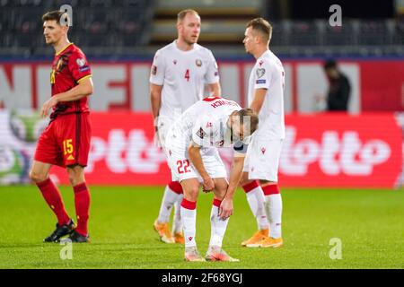 LEUVEN, BELGIO - MARZO 30: Igor Stasevich della Bielorussia deluso durante la Coppa del mondo FIFA 2022 Qualifier Qatar match tra Belgio e Bielorussia a. Foto Stock