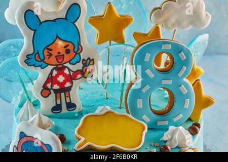 Torta basata sul gioco Toka Life, per una ragazza di otto anni per il suo compleanno. Foto Stock