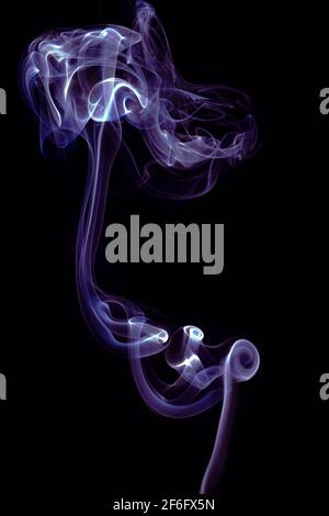 Volute di fumo Foto Stock