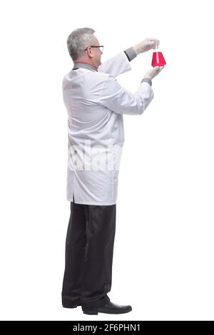 Side view of senior male researcher carrying out scientific research Stock Photo