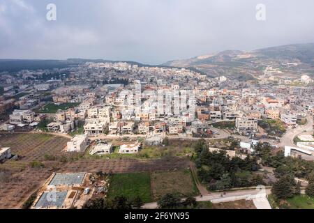 Masade Druze case villaggio in Israele nord Golan Heights, vista aerea. Foto Stock