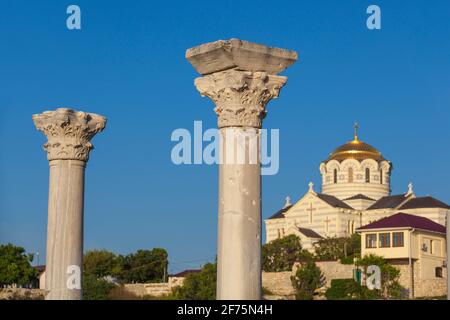 Ukraine, Crimea, Sevastopol, Ancient City of Khersoness, Ruins of ancient theatre with St Vladimir's Cathedral in background Stock Photo