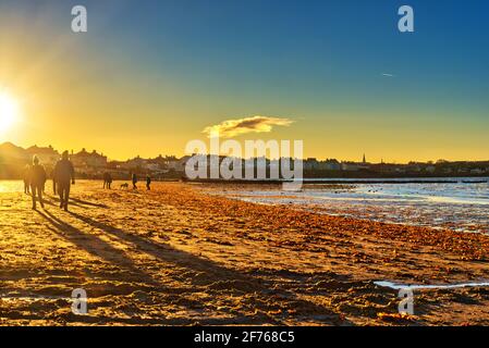 Tramonto su Ballyholme Beach, County Down, Irlanda del Nord Foto Stock