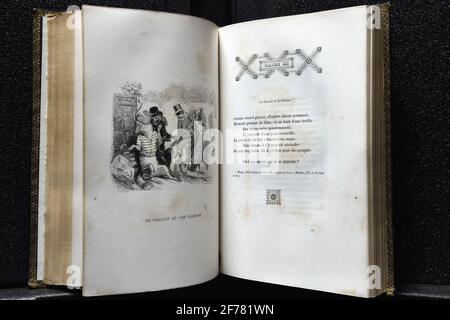 Francia, Aisne, Château-Thierry, Jean de la Fontaine Museo - città di Chateau-Thierry, la Fontaine's Fables libro, edizione illustrata (Fournier Ainé 1839 - 1a edizione nel 1838) dal fumettista Jean Jacques Grandville, la volpe e le uve fiabe XI del libro III Foto Stock