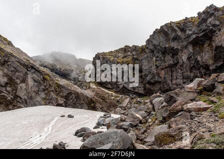 Escursioni sul Monte Taranaki in una soleggiata giornata estiva, Nuova Zelanda Foto Stock