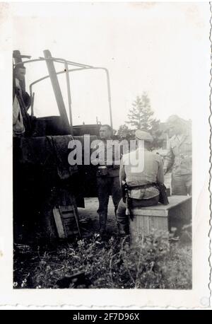 soldats de la waffen SS à l'arrière d'un camion Foto Stock