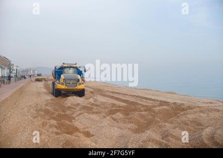 Lavorare sulle difese marine Foto Stock