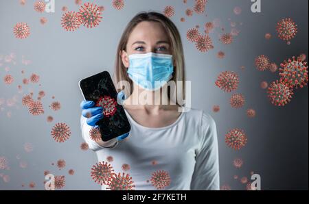 Donna che tiene smartphone con corona background.Confident giovane donna medico mostrare dispositivi medici, incoraggiare le persone a rimanere all'interno, combattere le malattie Foto Stock